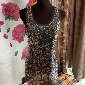 Wildcat racer back tank top embellished with gray/silver tone sequins. Size XS/S
